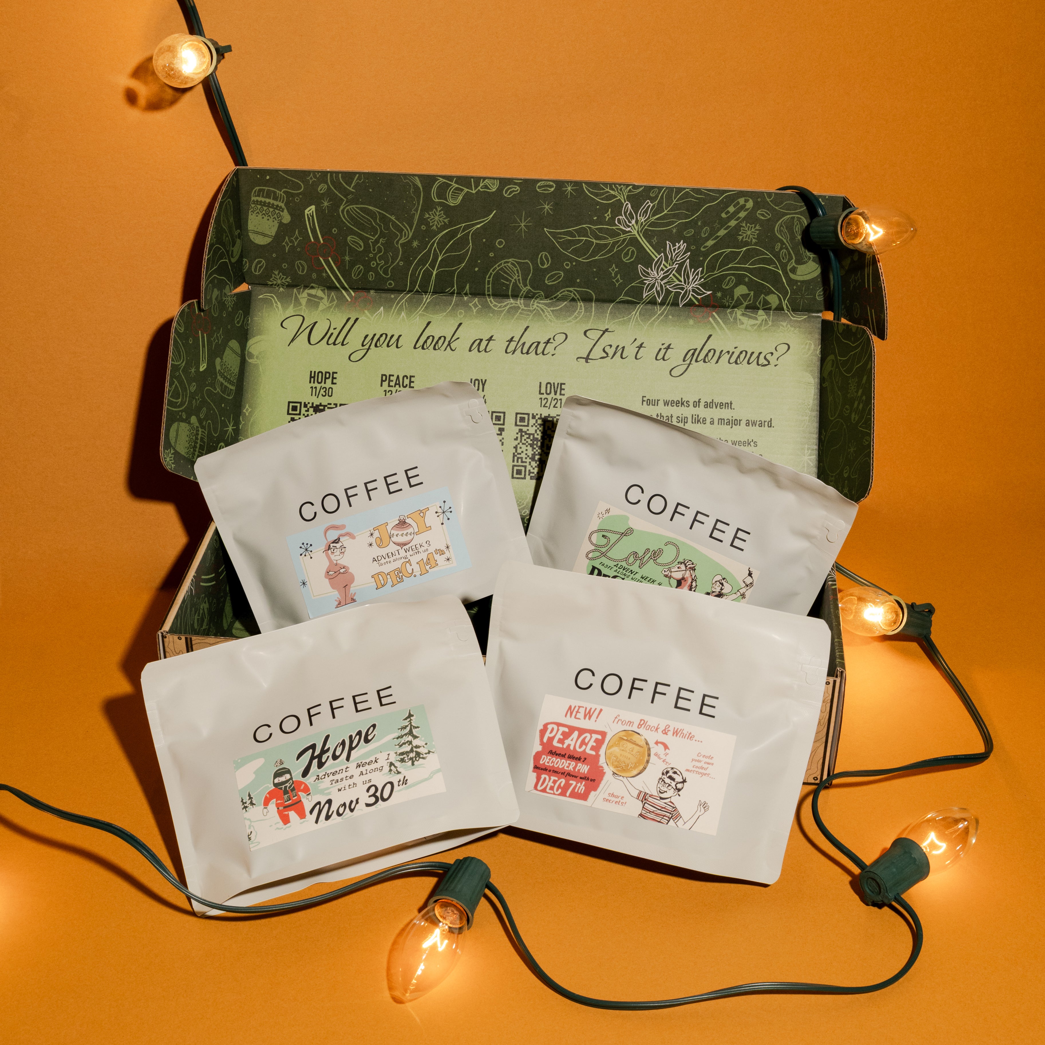 2025 B&W Advent Calendar: A holiday coffee kit with four themed bags for each Advent week—Hope, Peace, Love, Joy—inside a decorative box.