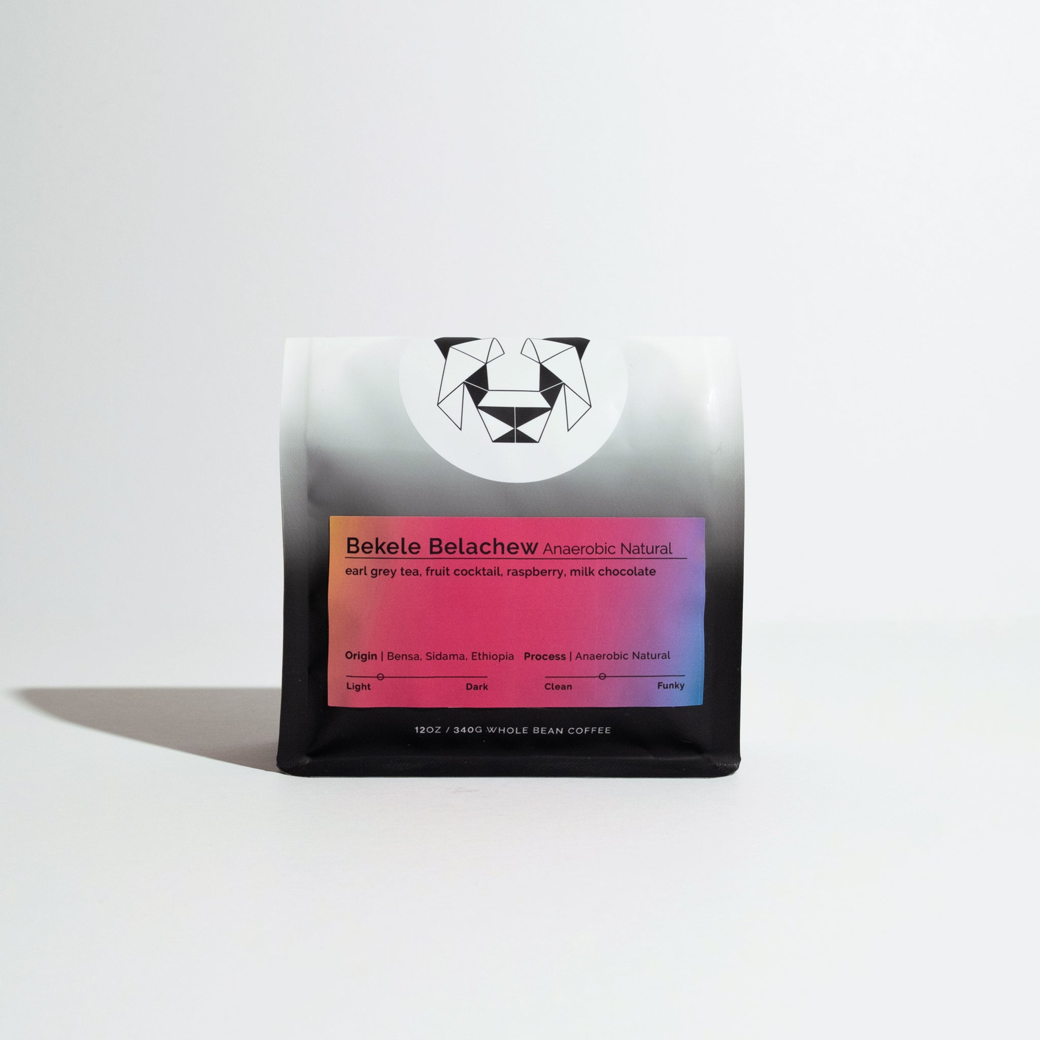 Bekele Belachew Anaerobic Natural whole-bean coffee, 12 oz bag with gradient label, showcasing tasting notes and origin details.