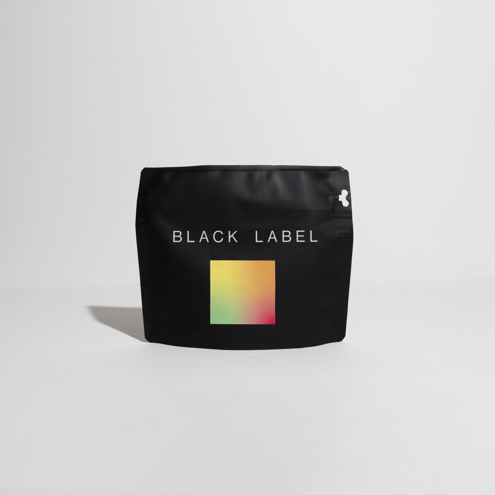 Black Label named bag of coffee featuring, Pepe Jijón - Typica Wave Nature coffee beans, cultivated at Finca Soledad, showcasing a unique, naturally processed blend with tropical and floral notes.
