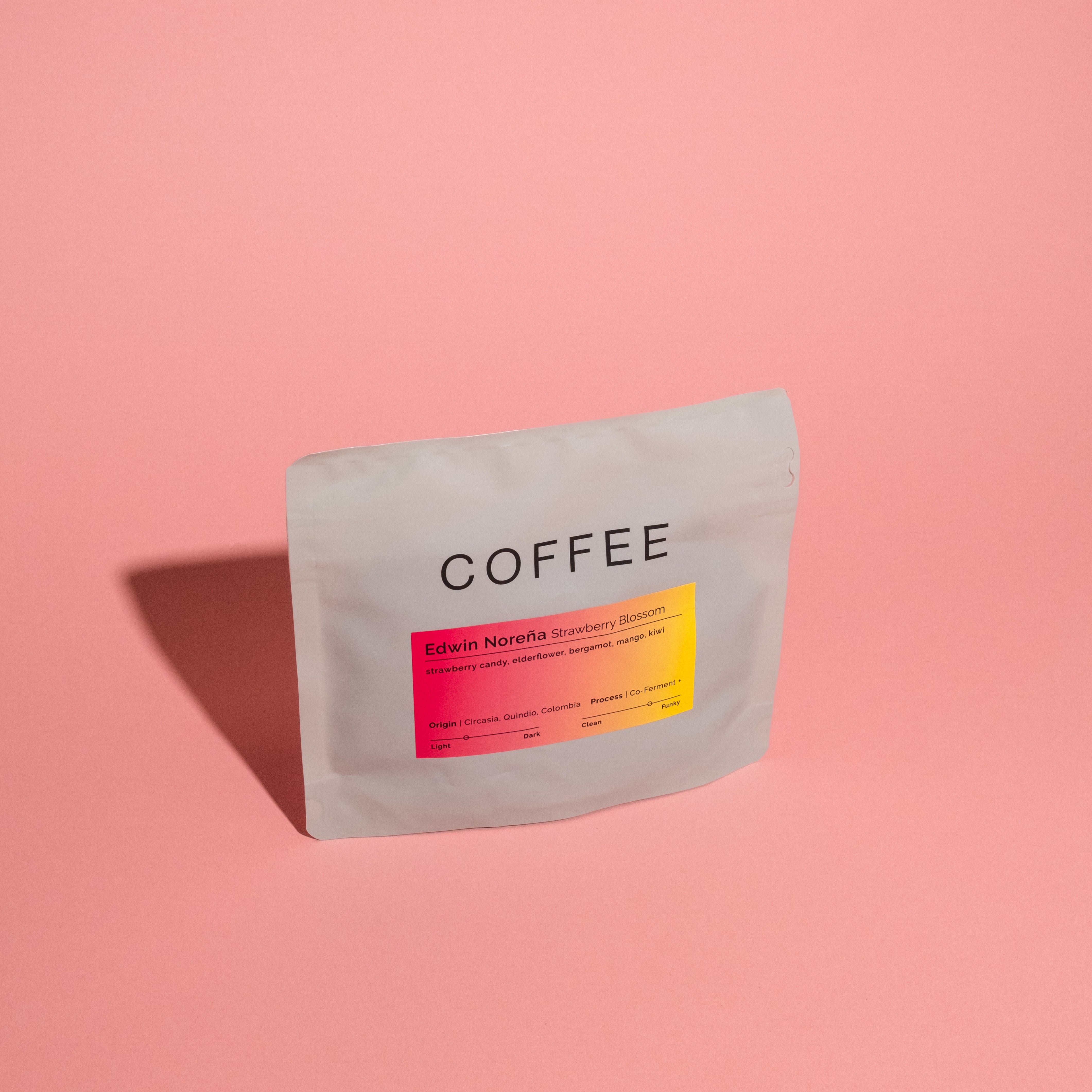 Edwin Noreña - Strawberry Blossom coffee blend, featuring expertly processed beans with unique fermentation techniques, highlighting florality and fruitiness from Red Fruits, Golden Washed, and Lychee lots.