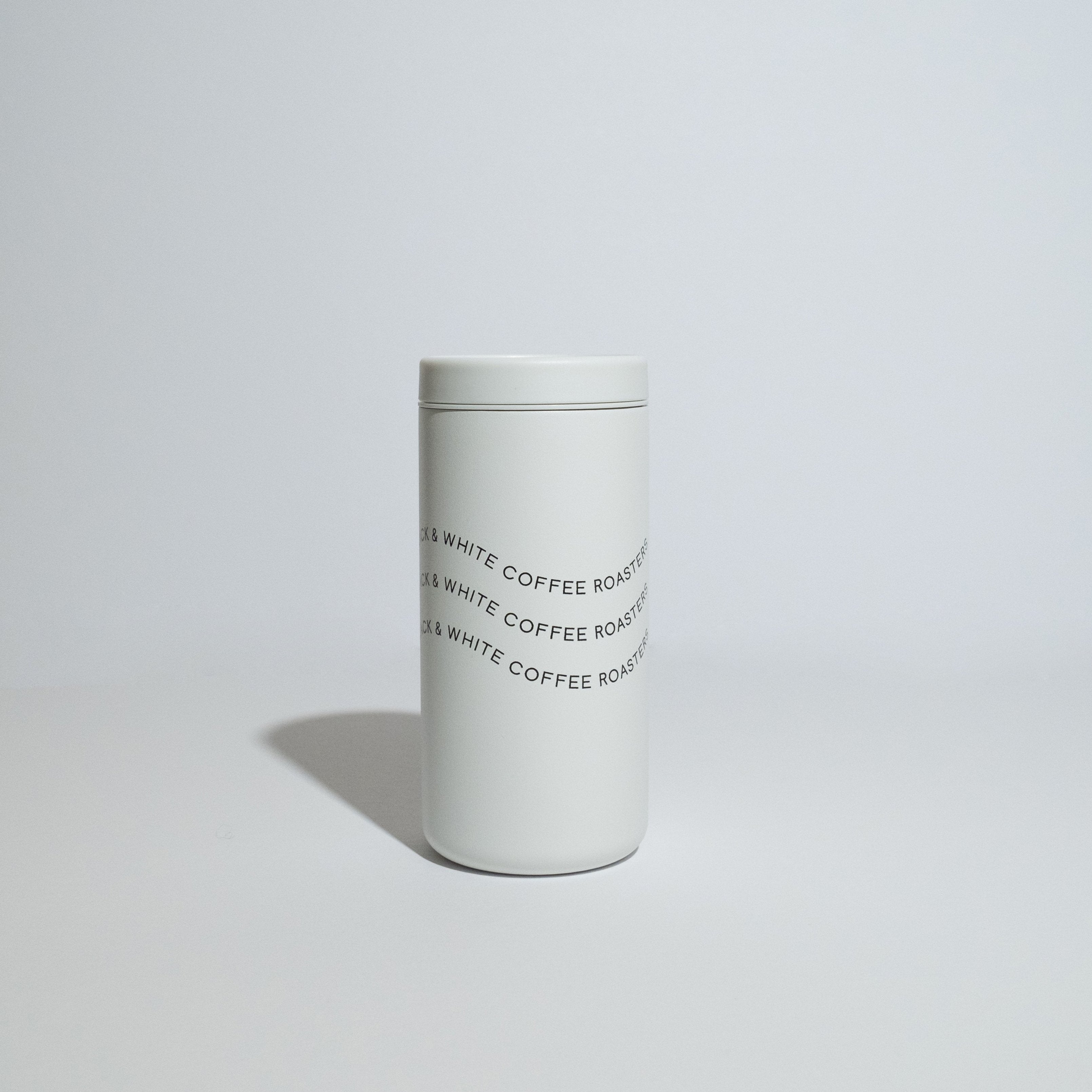 B&W Nomad Travel Cup with a 360-degree twist-open, leak-proof lid, 12oz capacity, powder coat finish, and double-walled insulation for maintaining temperature up to 10 hours.