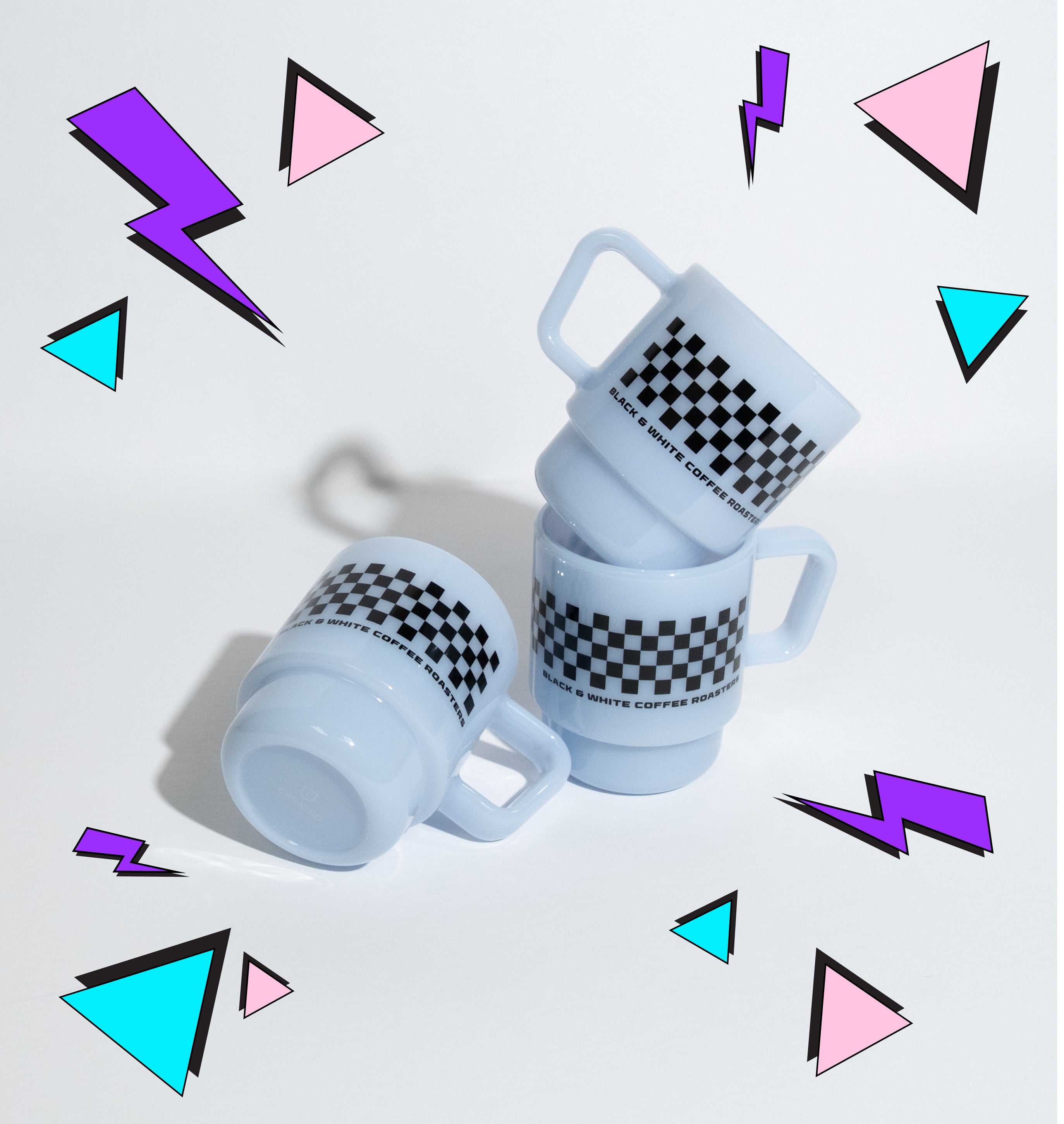 Three light blue ceramic mugs with black and white checkered bands, arranged on a clean white surface against a white background.