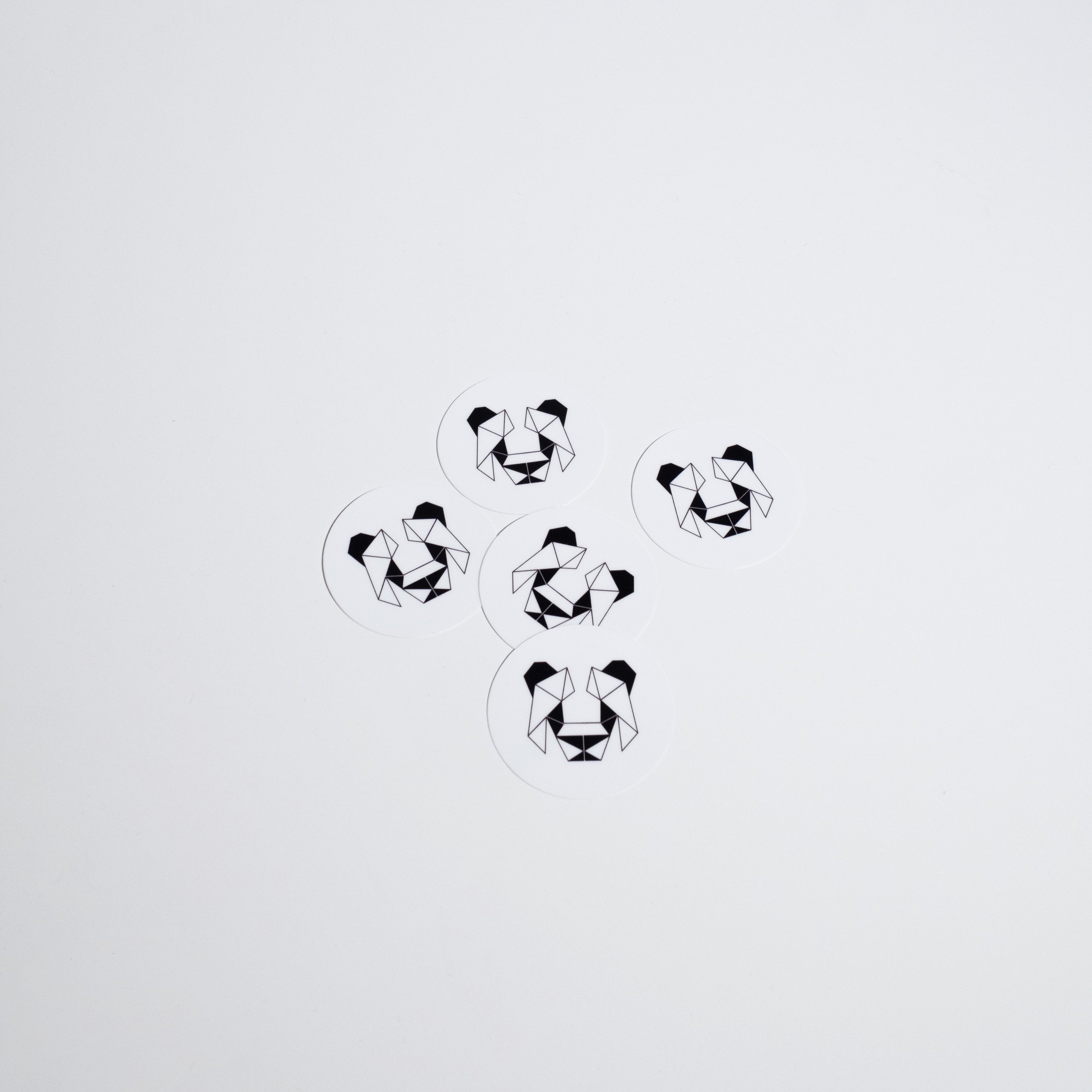 Geometric Panda Sticker, a durable 2 x 2 weatherproof sticker featuring a classic geometric panda design, perfect for customizing various surfaces.