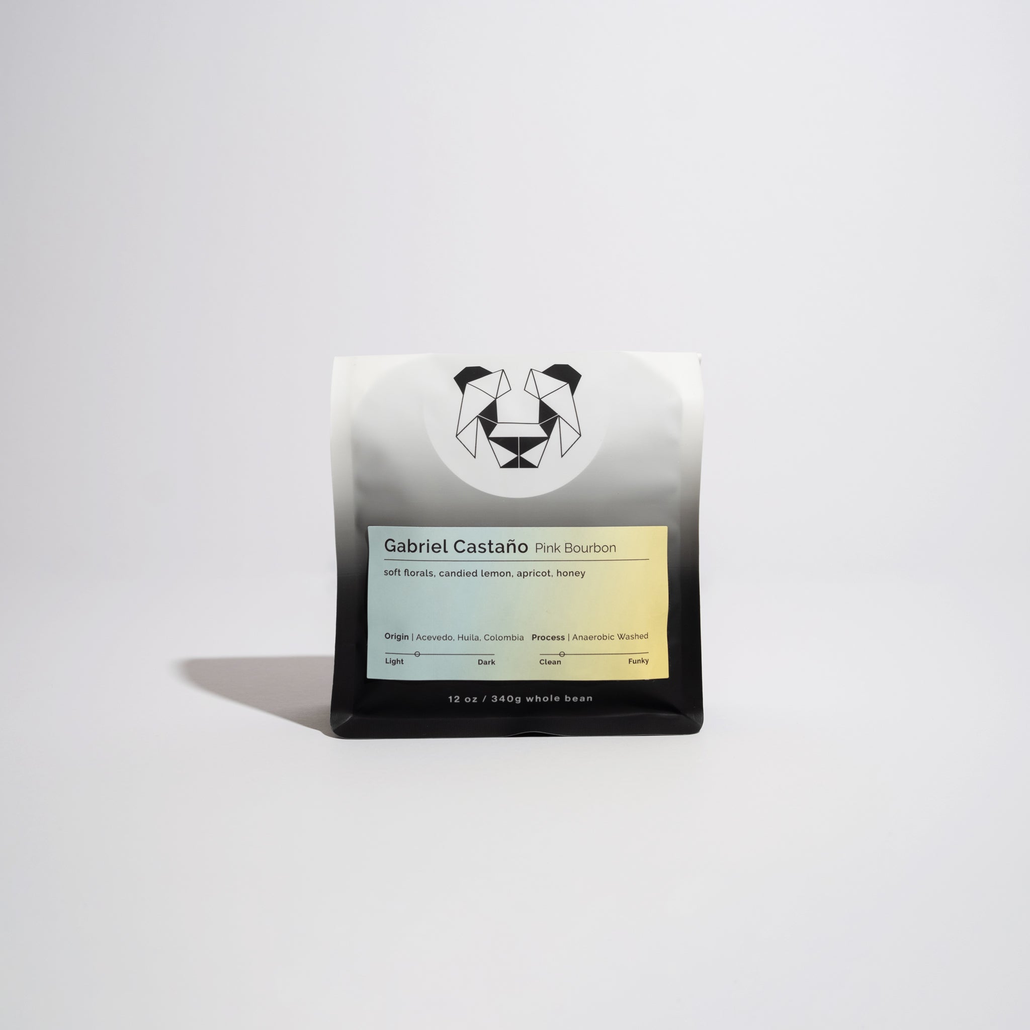 Gabriel Castaño - Pink Bourbon coffee beans displayed in a bag, emphasizing their unique origin, anaerobic process, and exquisite flavor profile from Huila, Colombia.