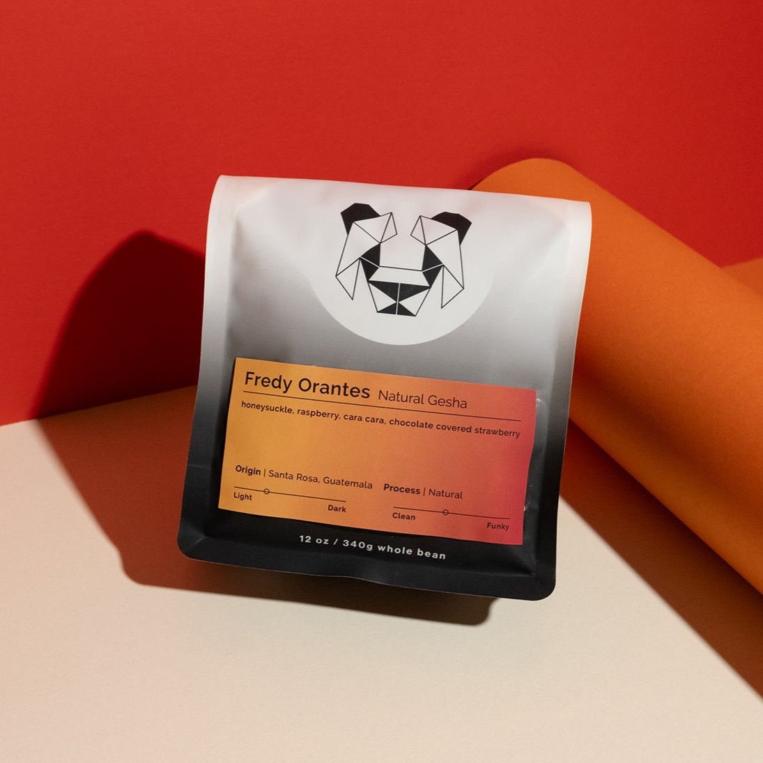 Fredy Orantes - Natural Gesha coffee beans, meticulously processed for quality and sustainability, showcasing vibrant florals, citrus notes, and chocolate-dipped berry nuances.