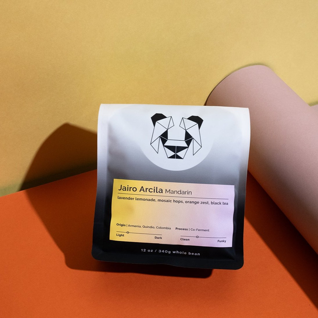 Jairo Arcila - Mandarin coffee, featuring a unique Castillo lot, co-fermented with mandarin skin, emphasizing specialty Colombian coffee with citrusy, lavender lemonade notes.