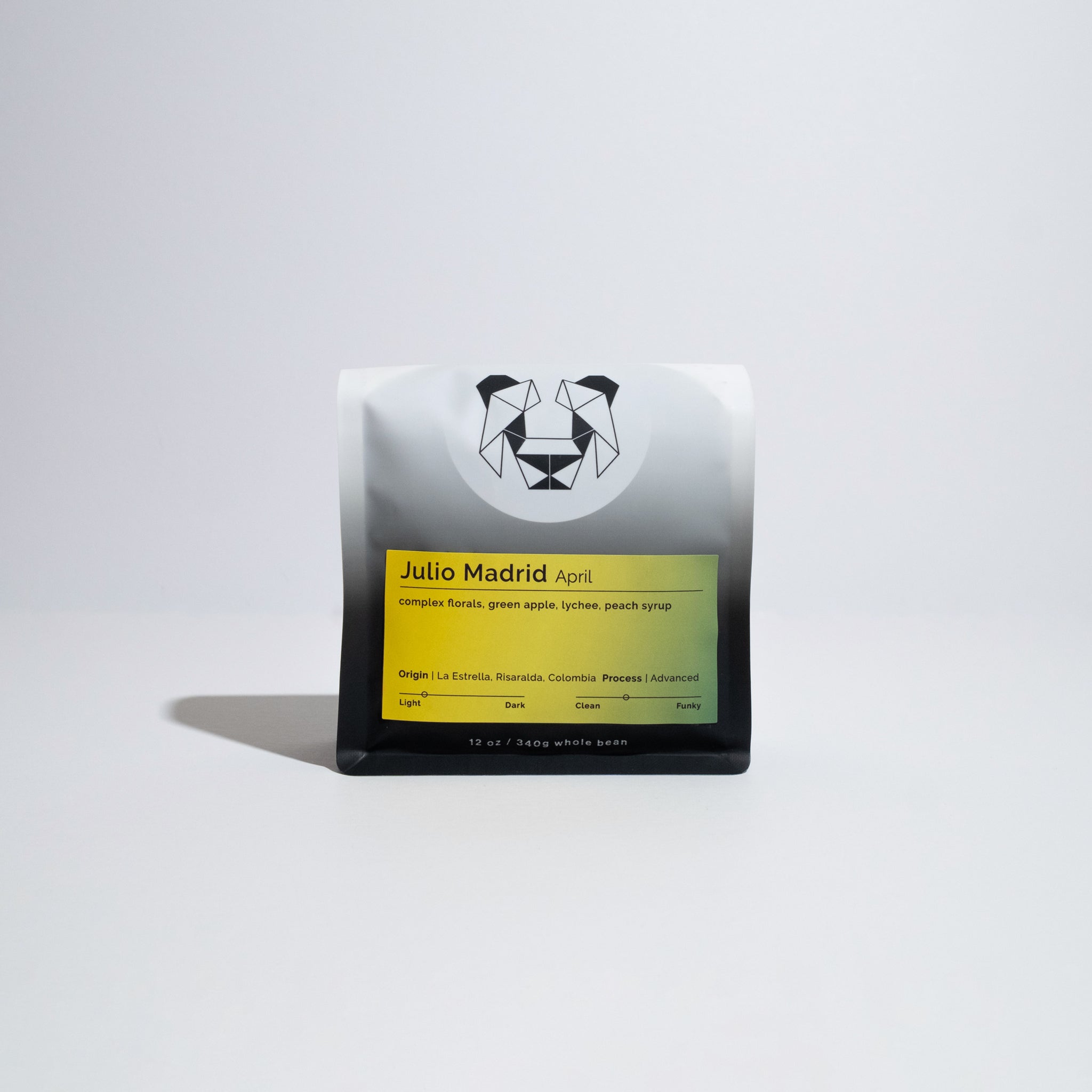 Julio Madrid - April coffee, showcasing Finca La Riviera's co-fermented beans with floral, green apple, and tropical fruit notes, emphasizing advanced processing techniques.