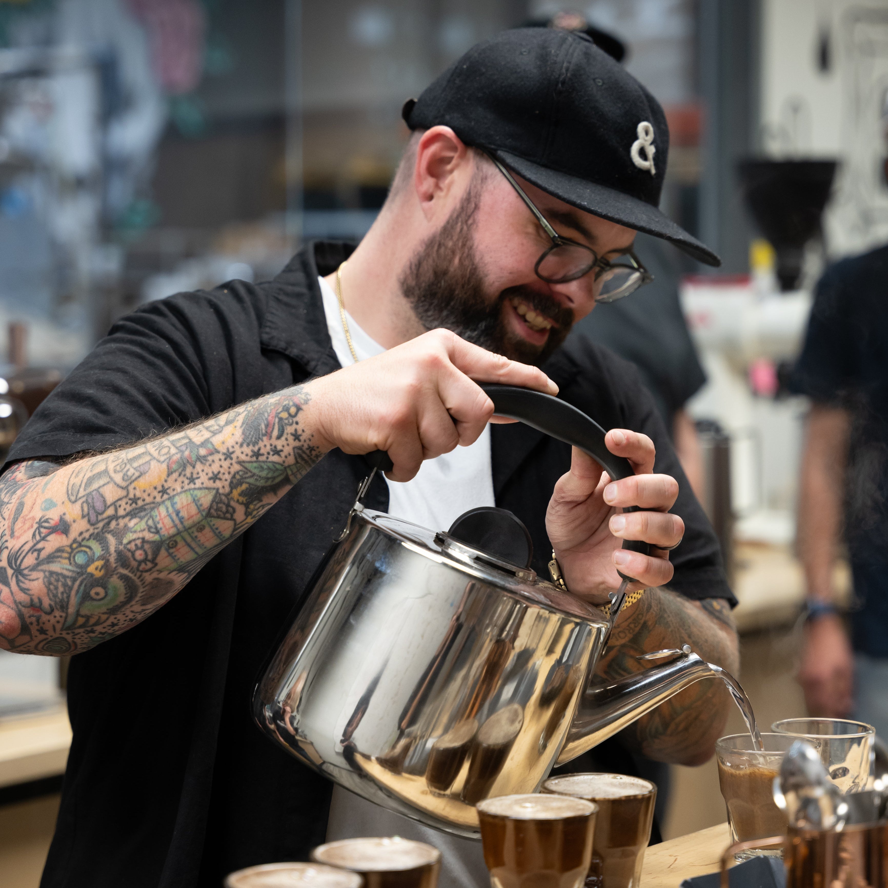 Tasting Experience & Roastery Tour at Black & White Roasting in Raleigh, includes class admission and a 12oz bag of coffee.