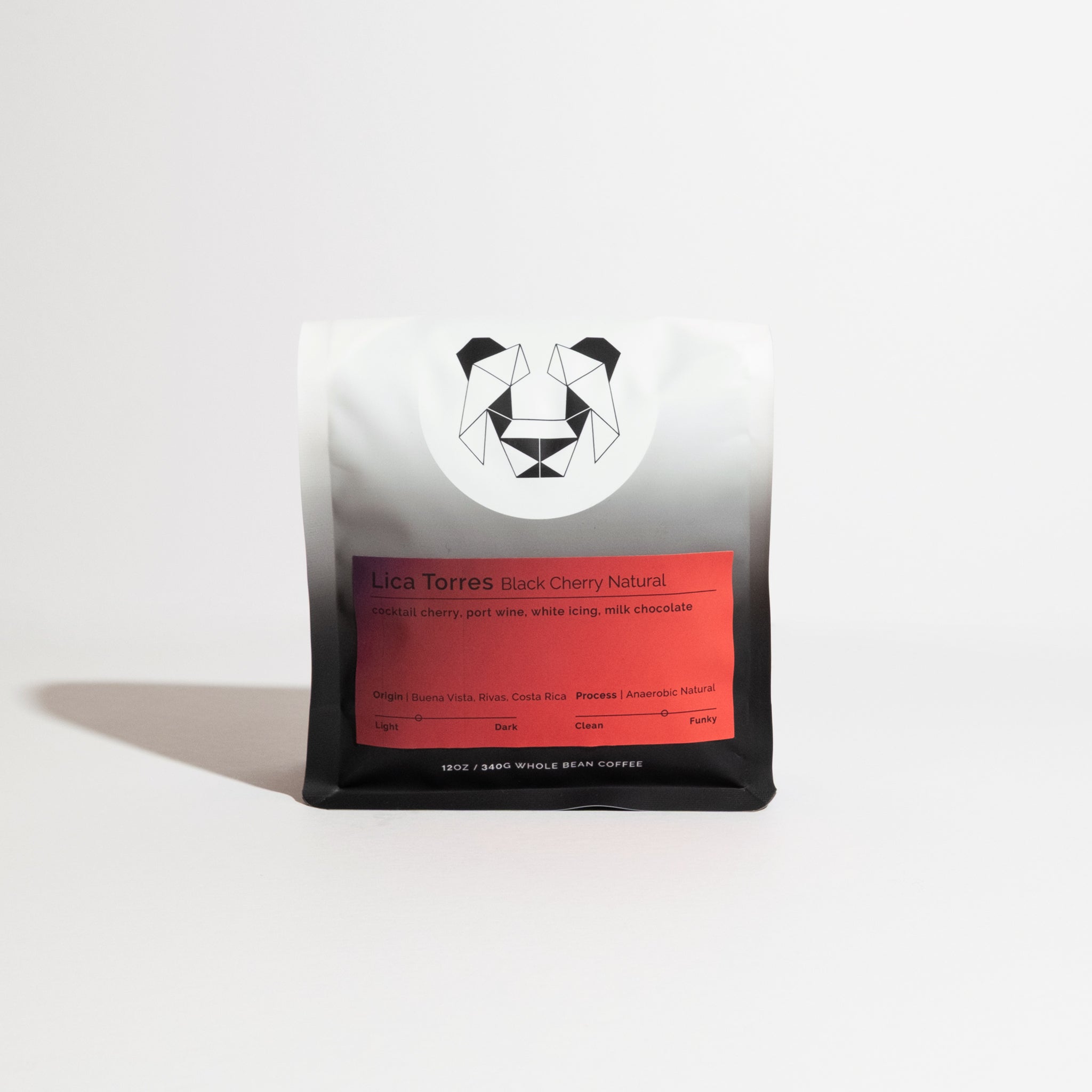 Lica Torres - Black Cherry Natural coffee, 12 oz bag with a red label featuring tasting notes and origin, showcasing a unique anaerobic natural process.