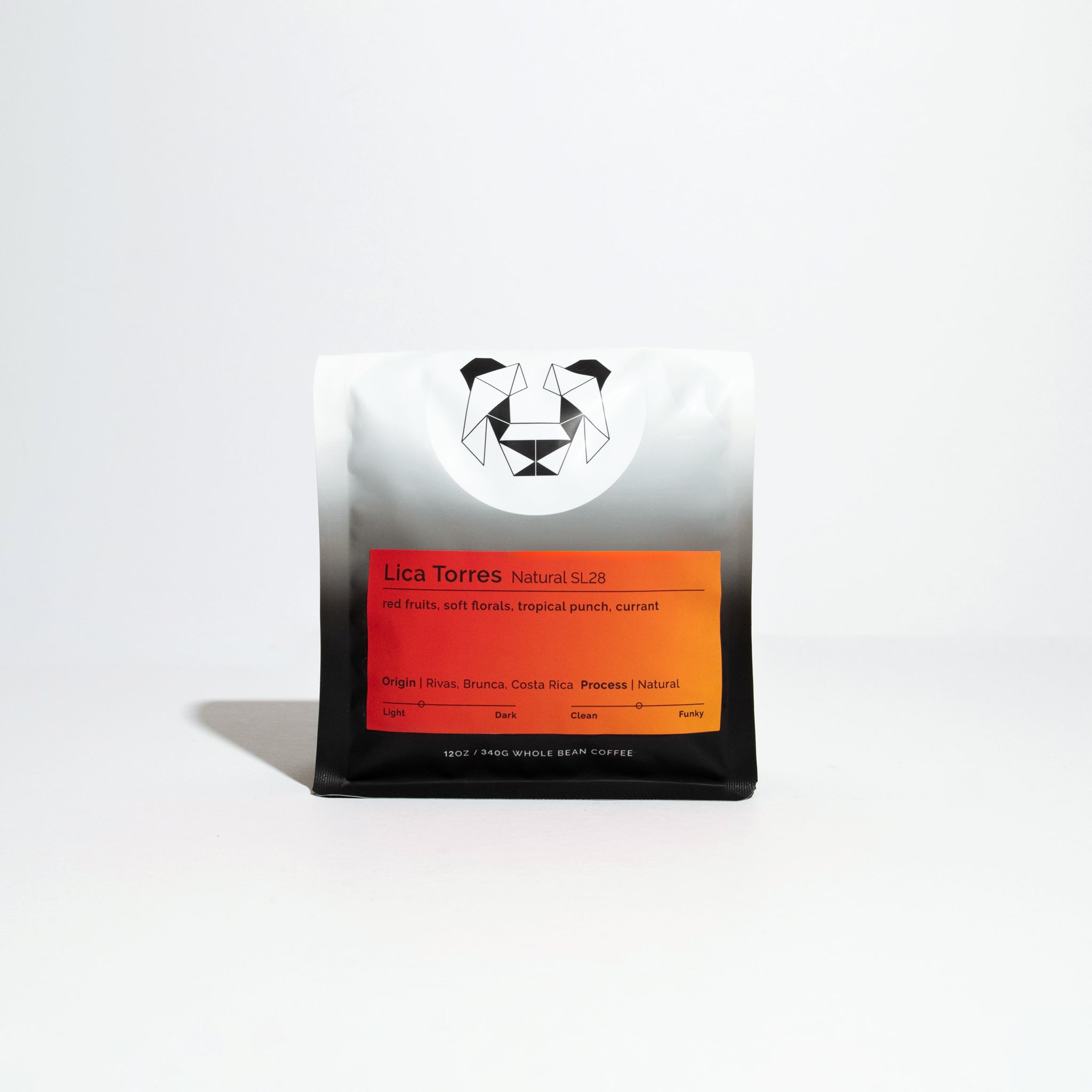 Lica Torres Natural SL28 coffee pouch, featuring tasting notes of red fruits and soft florals, from Rivas, Costa Rica, with a geometric animal-face logo.