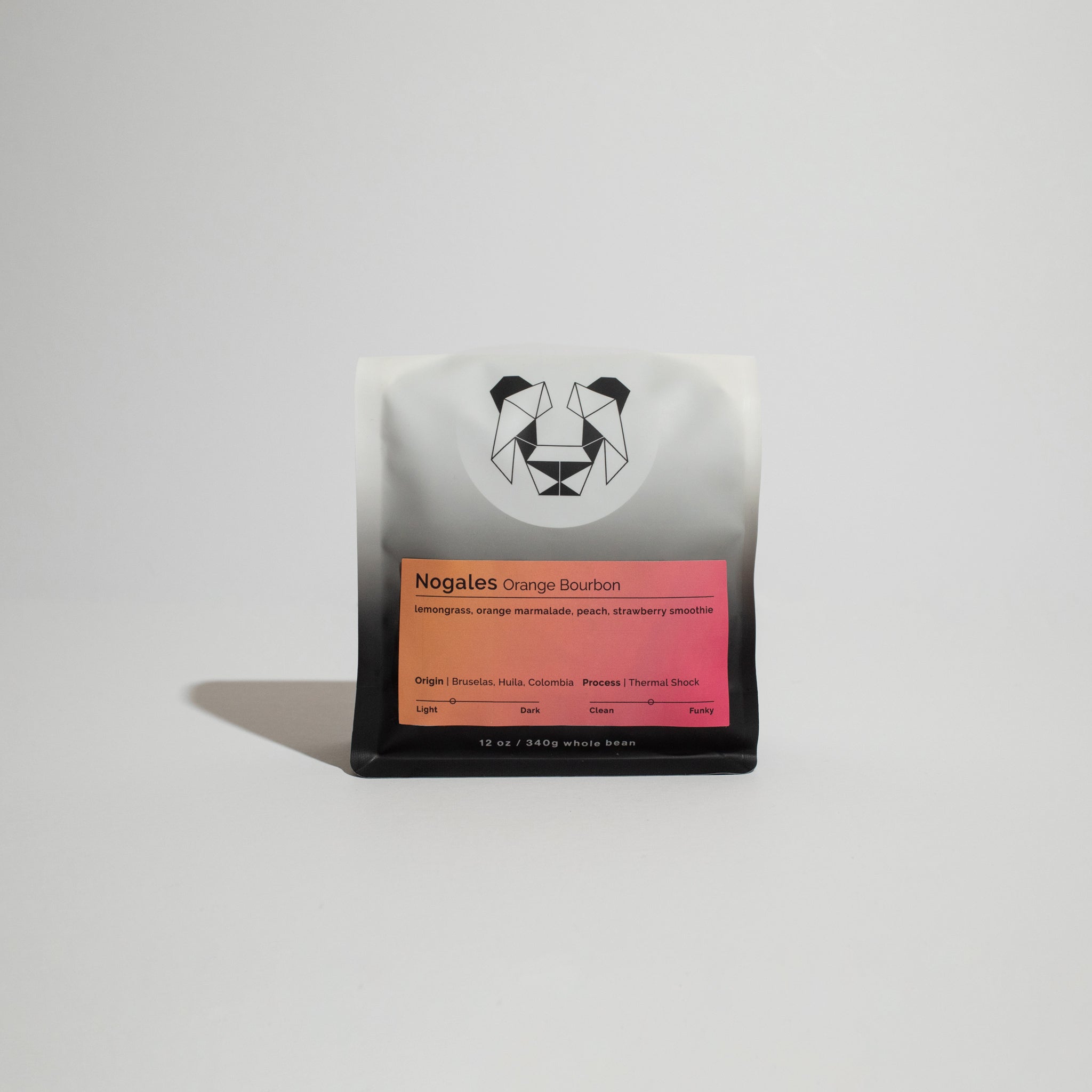 Nogales - Orange Bourbon coffee beans from Los Nogales farm, showcasing a blend of tradition and innovation in specialty coffee processing by Oscar Hernandez.