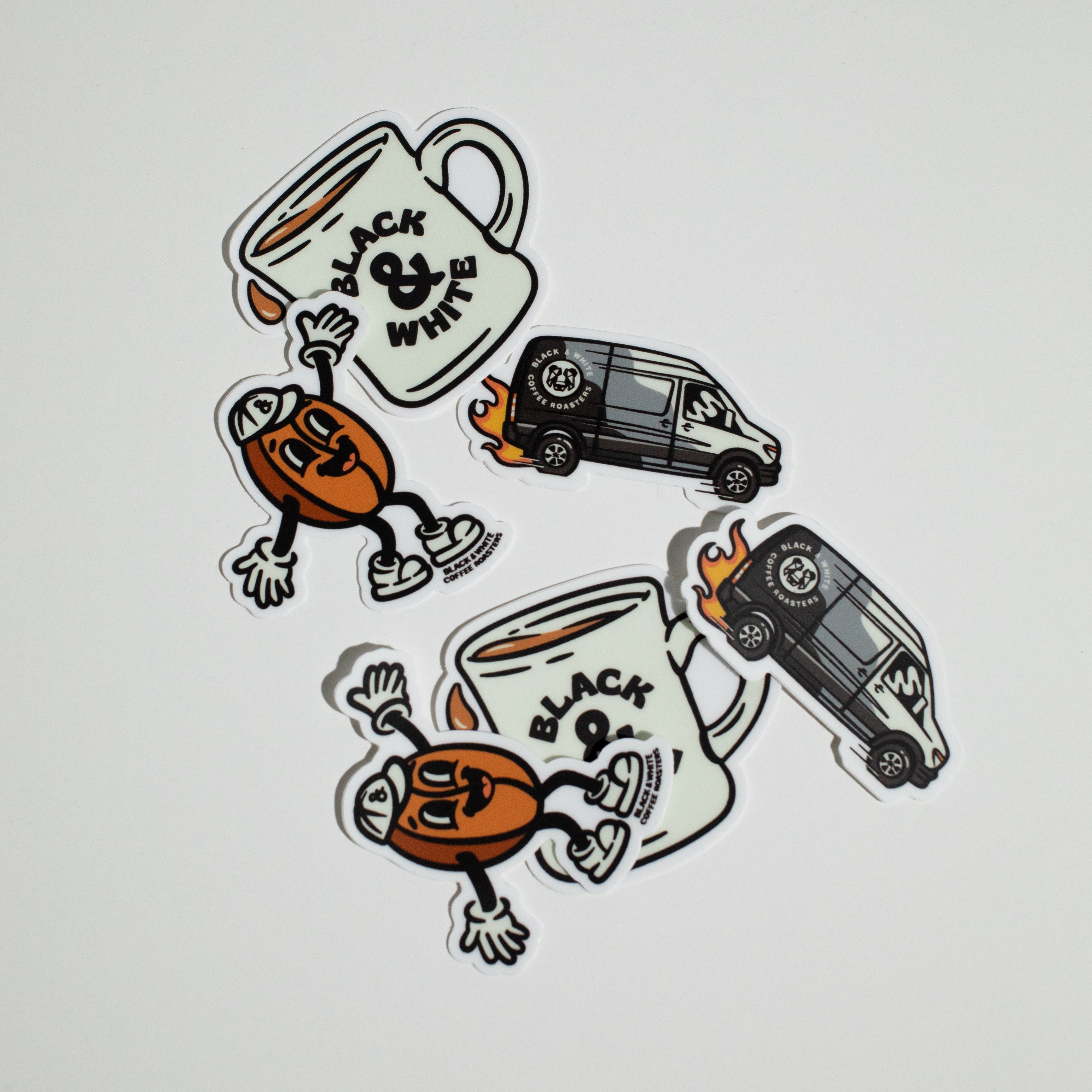 B&W Dancing Bean Sticker, a panda van with fire coming from its wheels, and a traditional diner mug featuring a playful illustration by Sage Pizza, measuring 2 inches by 2 inches.