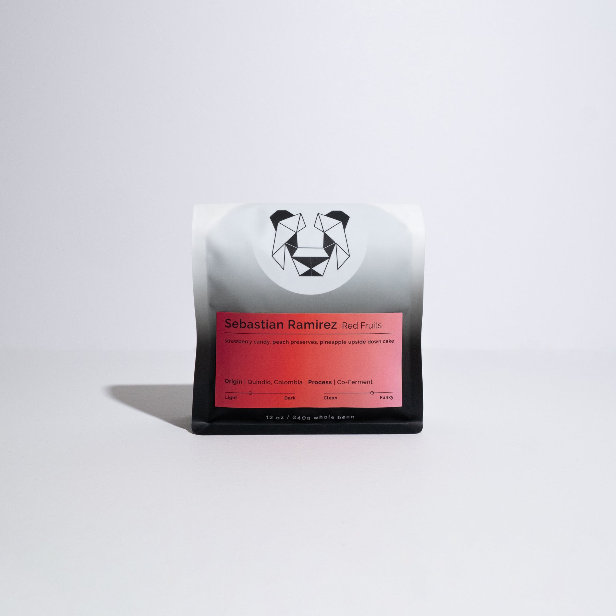 Sebastian Ramirez - Red Fruit coffee packet, highlighting its unique co-ferment process with strawberries, crafted by renowned producer Sebastián Ramírez in Quindío, Colombia.