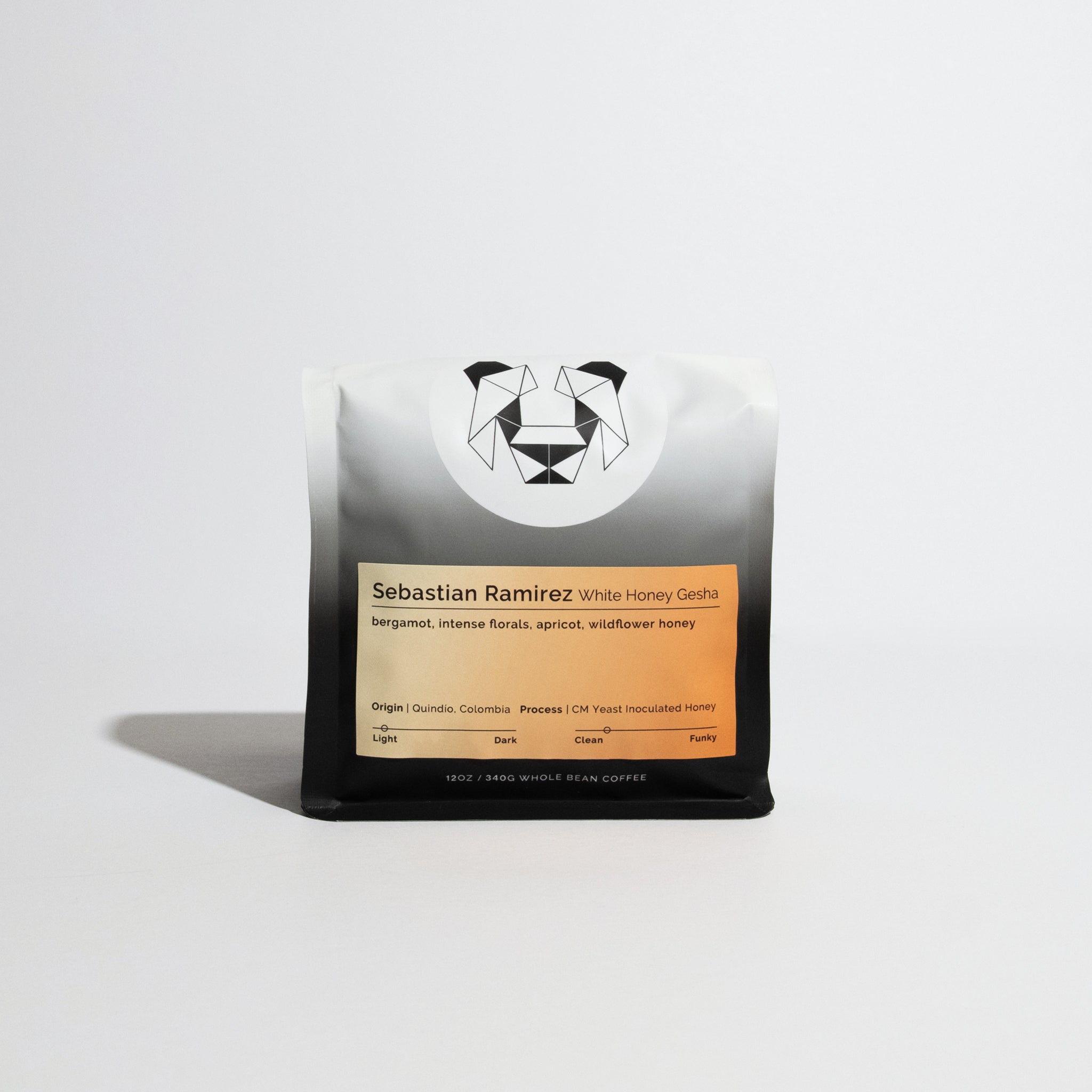 12 oz bag of Sebastian Ramirez - White Honey Gesha whole-bean coffee, featuring tasting notes of bergamot, florals, apricot, and honey, from Quindío, Colombia.