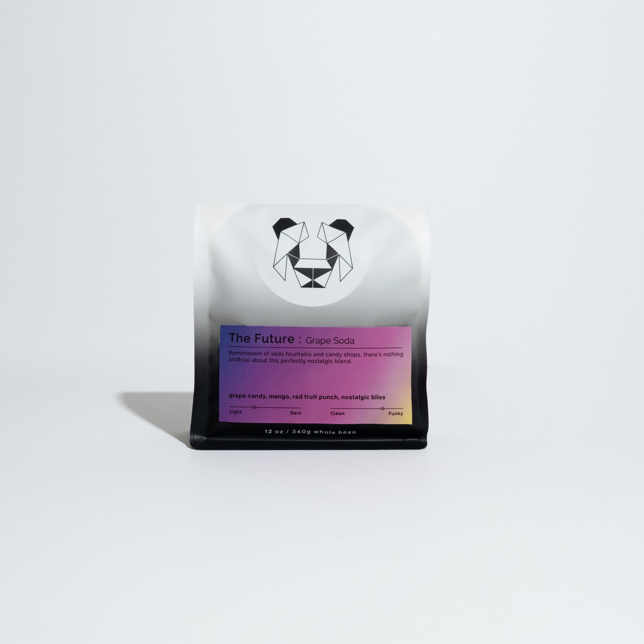Close-up of The Future - Grape Soda coffee blend packaging with a dog logo and purple label featuring product details.