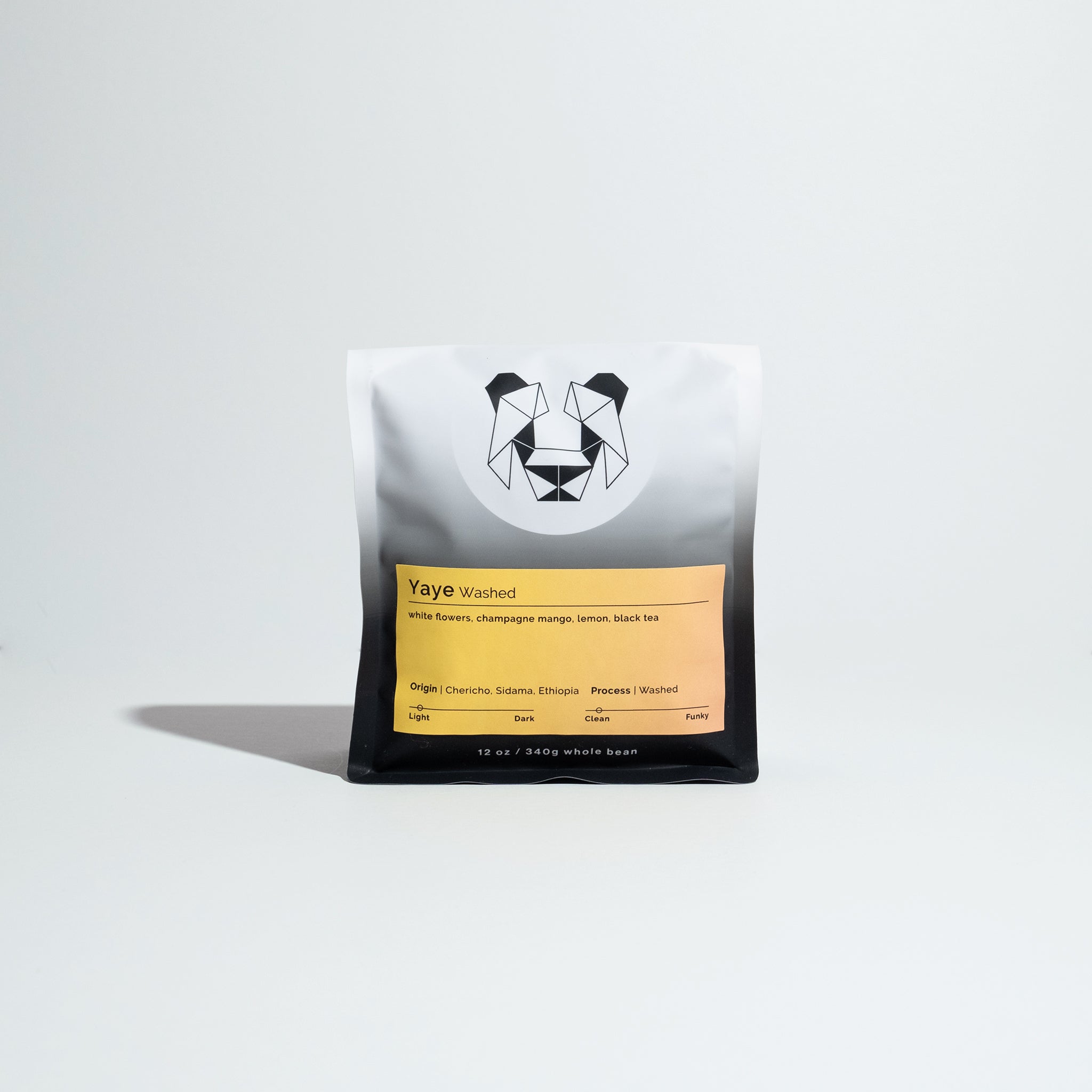 Yaye - Washed coffee beans from Ethiopia's Arbegona, displayed on raised drying beds, highlighting their unique processing and terroir at a high-elevation washing station.