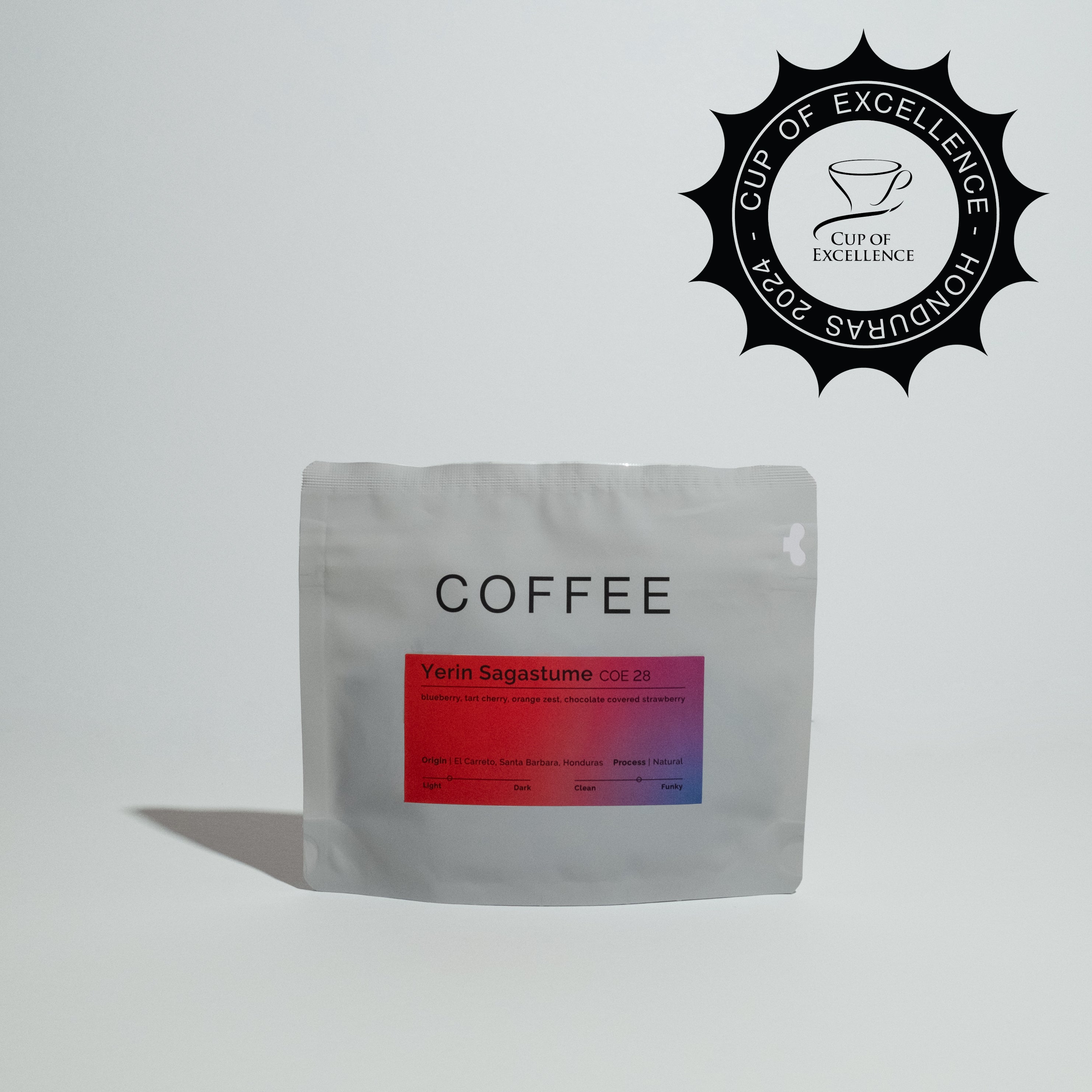 Yerin Sagastume - COE 28 coffee beans, showcased in packaging, highlighting their origin from Santa Barbara, Honduras, emphasizing specialty SL-28 variety and vibrant fruity notes.
