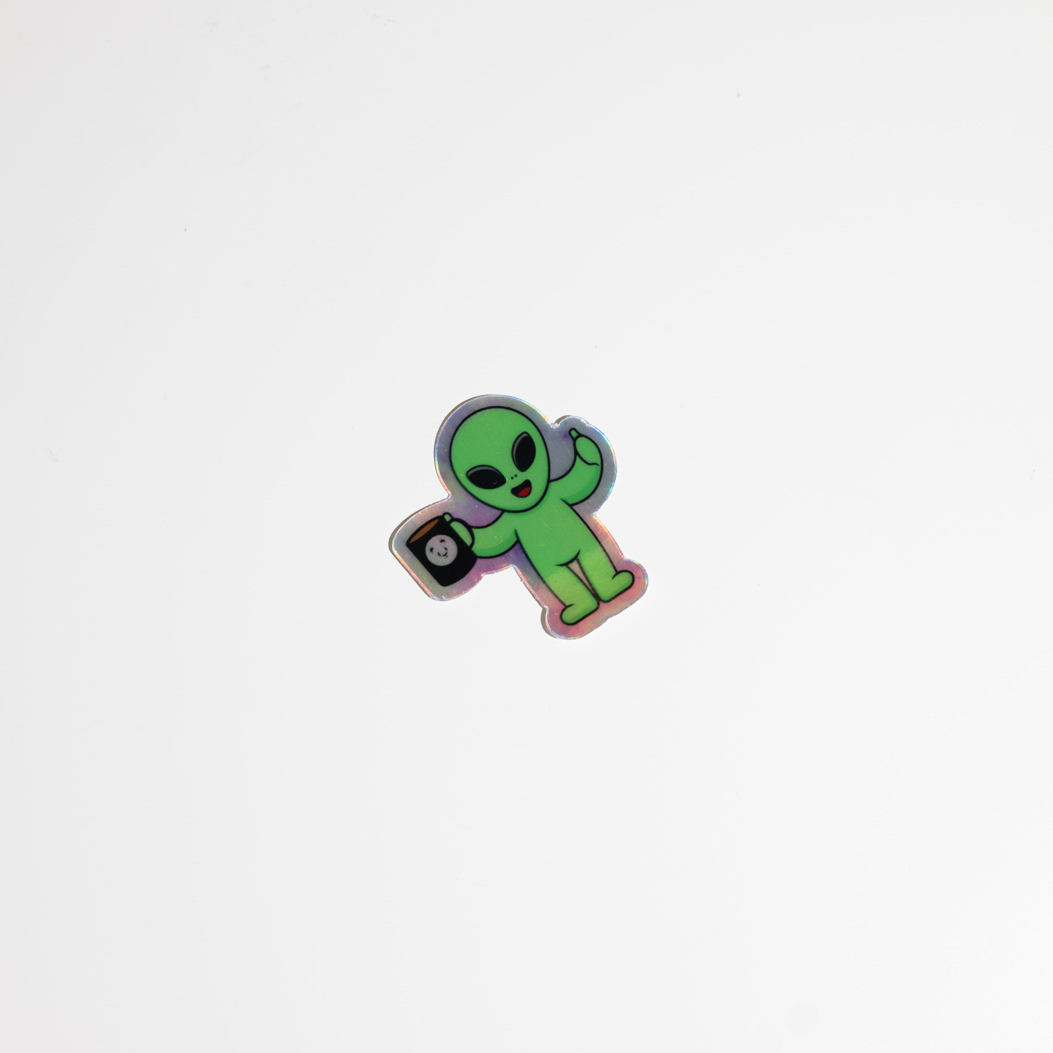 B&W Alien Holographic Sticker featuring a small alien design on a holographic background, measuring 1.85 x 2.