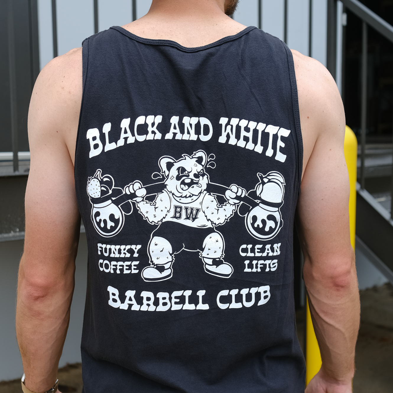 B&W Barbell Club Shirt featuring co-fermented coffee front design, Ghosttown.atl back graphic; heavyweight cotton for comfort and durability, perfect for gym enthusiasts.