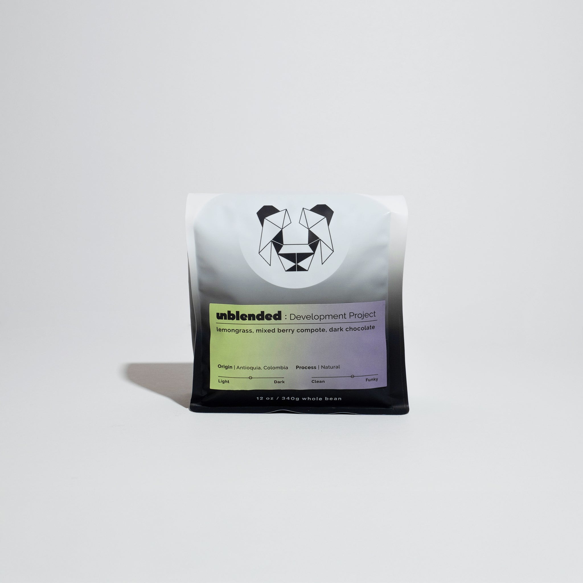 Unblended: Development Project coffee blend, sourced from young Colombian producers, showcasing natural processing, with aromas of lemongrass, hops, and notes of mixed berries and dark chocolate.