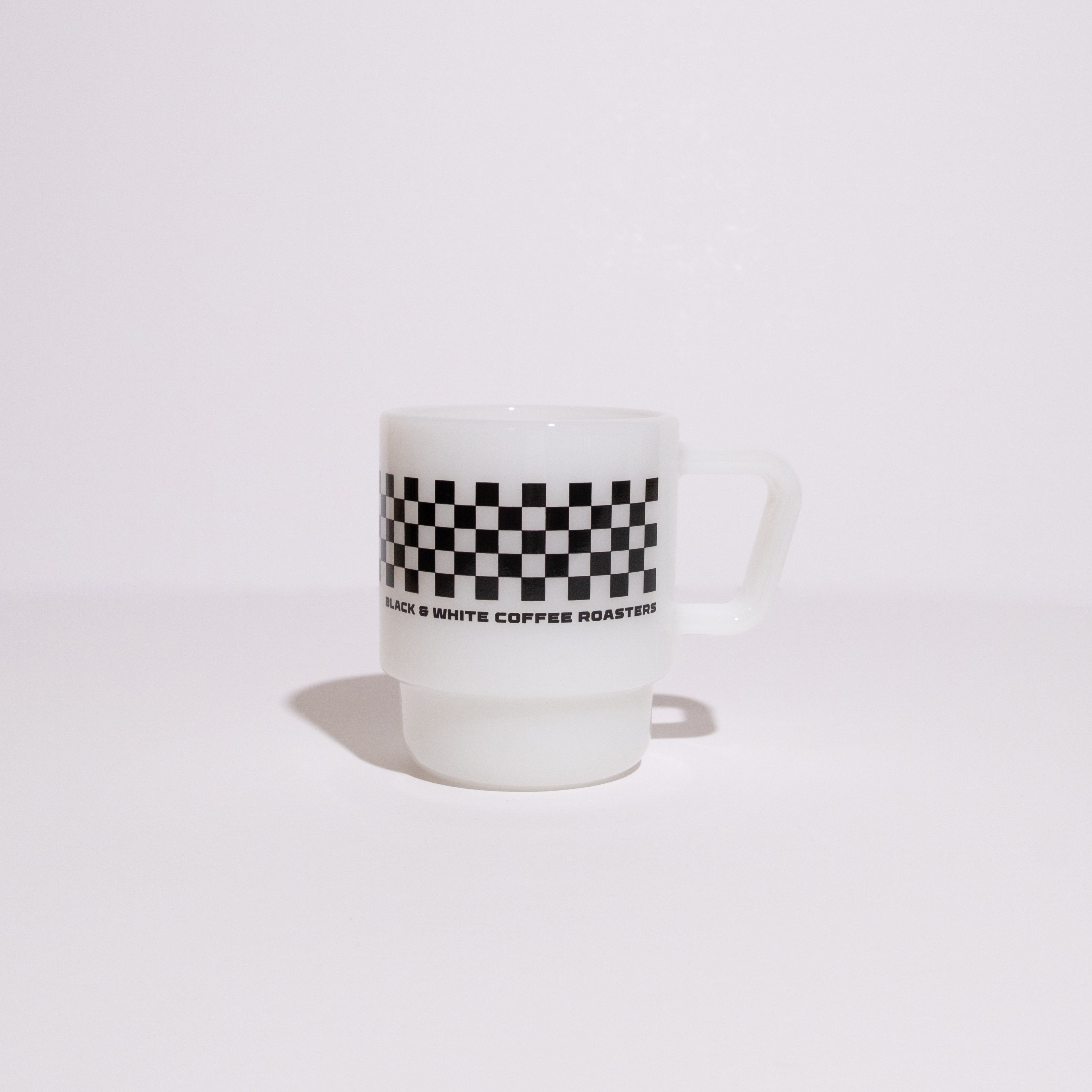 2025 Birthday Milk Glass Mug with a checkerboard band and bold text, featuring a squared handle, inspired by vintage milk glass design.