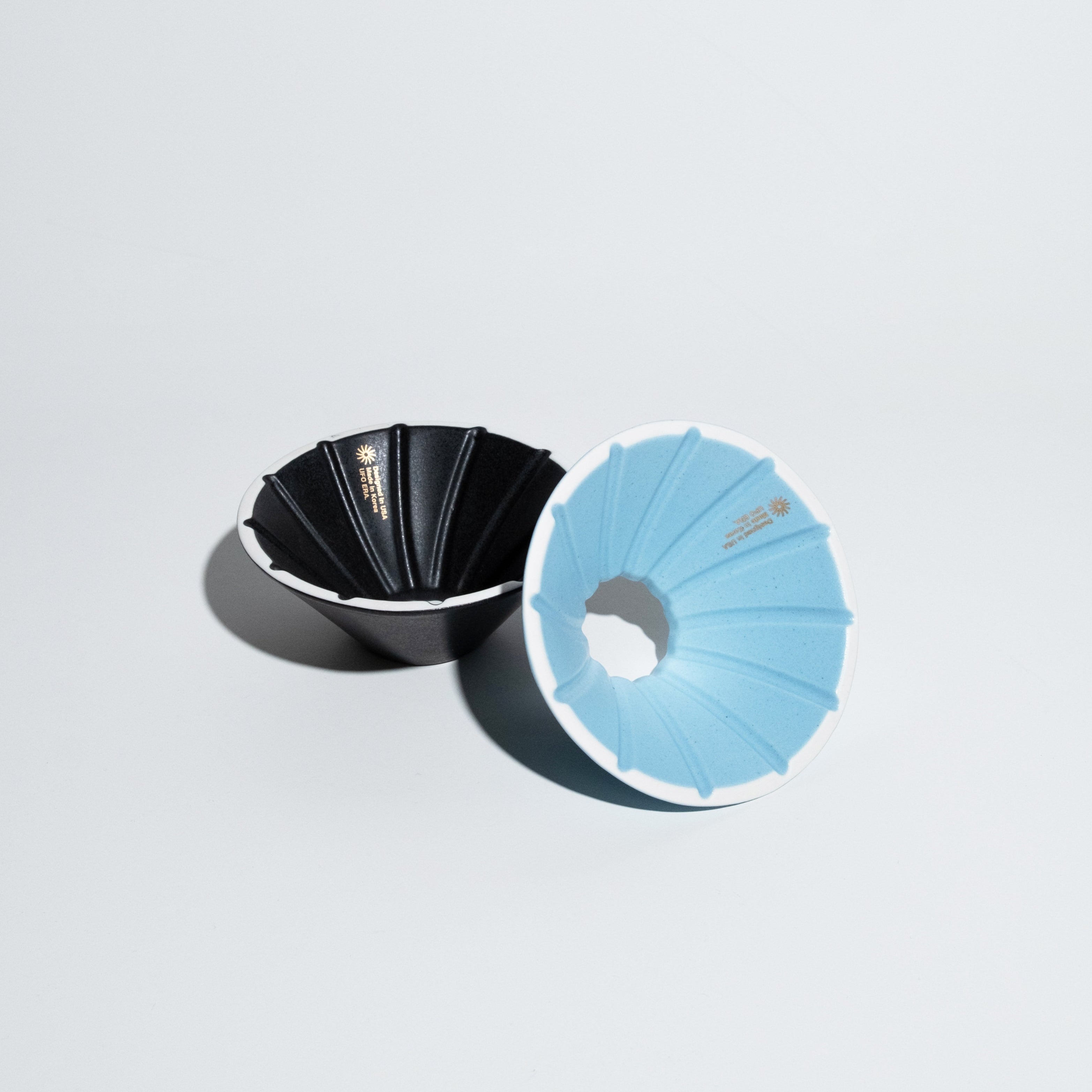 UFO Dripper - Ceramic, featuring a conical design with 80º angle and air channels, enhancing brewing consistency and clarity with innovative geometry and technology.