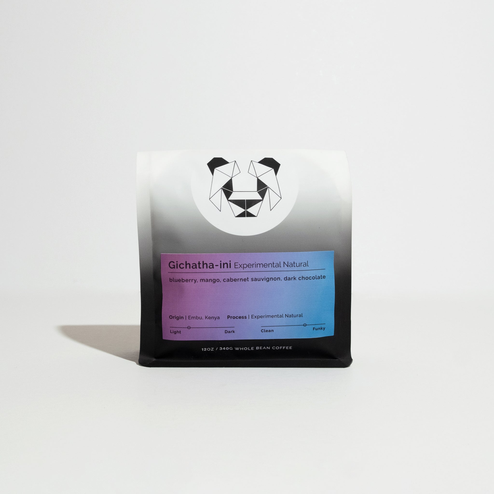 Retail bag of whole-bean coffee labeled “Gichatha-ini - Experimental Natural,” featuring tasting notes of blueberry, mango, cabernet sauvignon, and dark chocolate; origin Embu, Kenya.