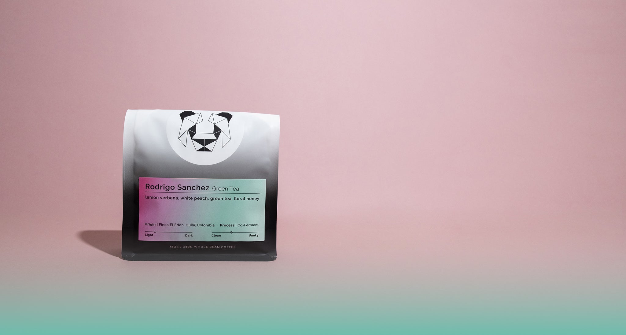 A bag of coffee on  a gradient backdrop. THe coffee says Rodrigo Sanchez Green Tea with notes of lemon verbena, white peach, green tea, floral honey.