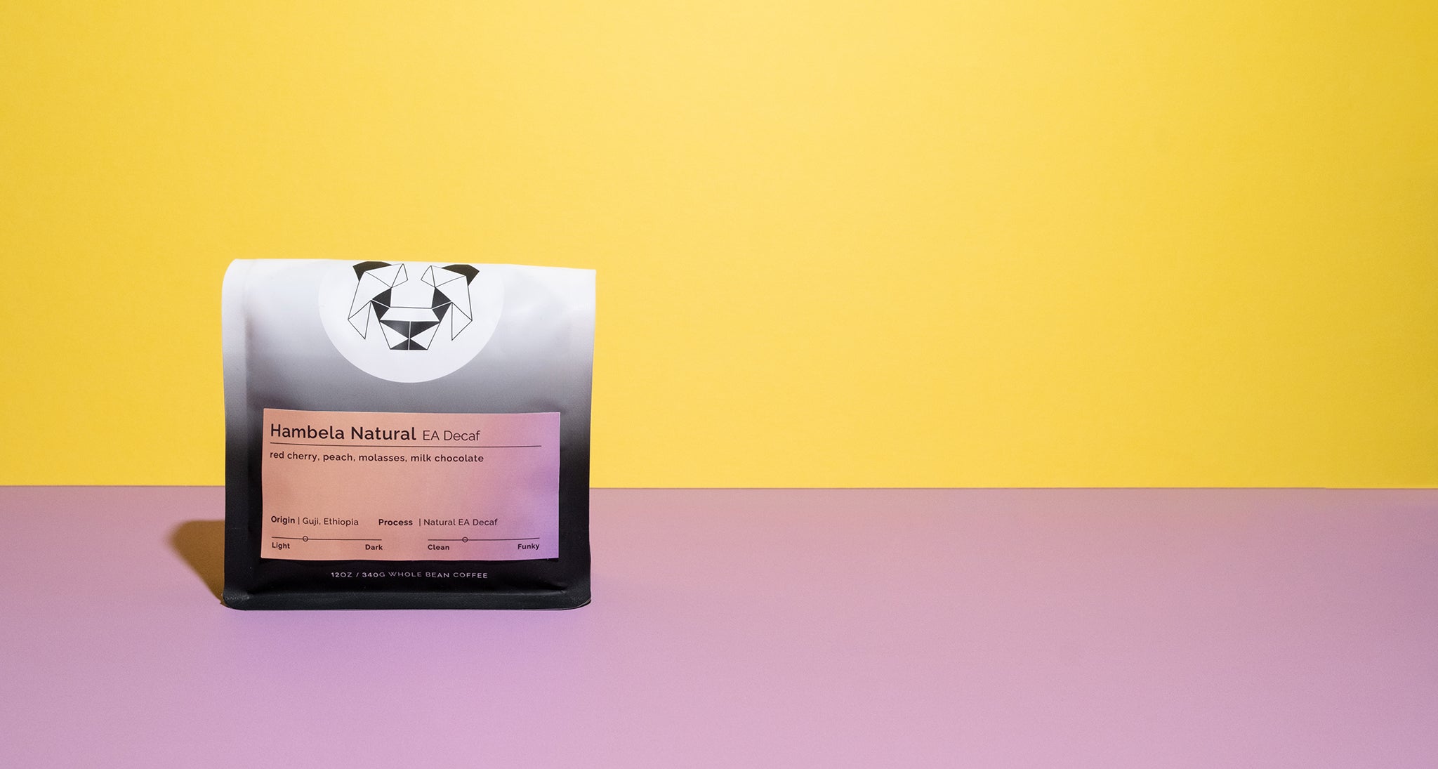Product packaging with a panda design on a yellow and pink gradient background