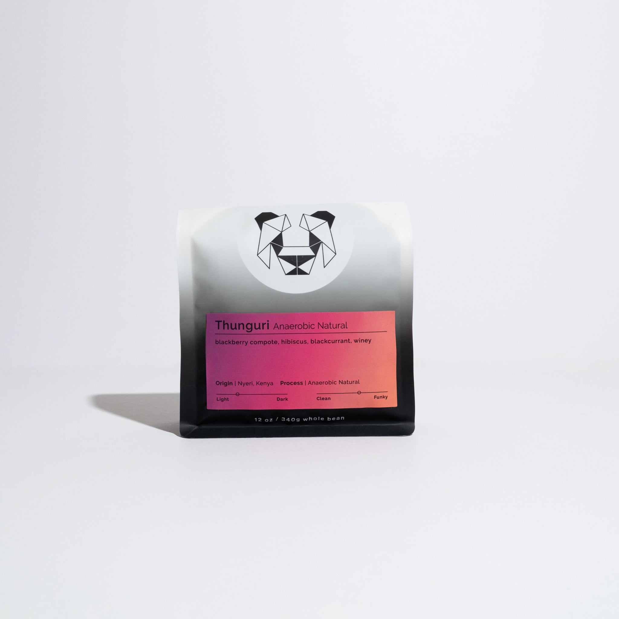 12 oz bag of Thunguri - Anaerobic Natural whole-bean coffee, featuring tasting notes of blackberry, hibiscus, blackcurrant, from Nyeri, Kenya.