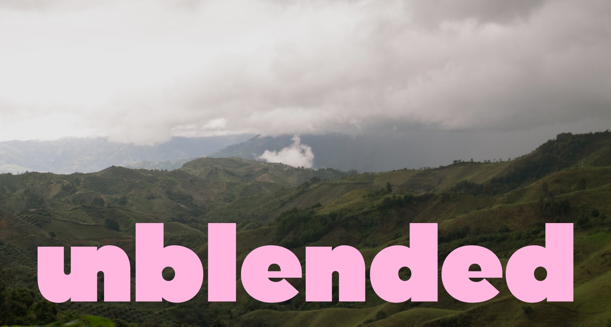 Mountain landscape with 'unblended' text overlay